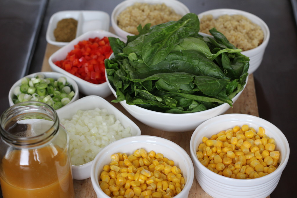 ingredients to make quinoa with spinach, bell peppers, and corn